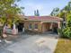 Single Gathering home with stone exterior and carport at 2201 30Th N Ave, St Petersburg, FL 33713