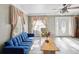 Living room with blue sofa and wood coffee table at 2201 30Th N Ave, St Petersburg, FL 33713