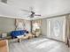 Living room with blue sofa, chair, coffee table, and hardwood floors at 2201 30Th N Ave, St Petersburg, FL 33713