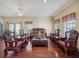 Living room with dark wood furniture and hardwood floors at 2201 30Th N Ave, St Petersburg, FL 33713