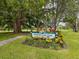 Crescent Lake Park entrance, featuring a sign and lush landscaping at 2201 30Th N Ave, St Petersburg, FL 33713