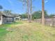 Large backyard with grassy area and fence at 23315 Charlston Pl, Land O Lakes, FL 34639