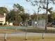 Community basketball court with chain link fence at 23315 Charlston Pl, Land O Lakes, FL 34639