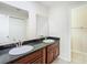 Double vanity bathroom with granite countertops at 23315 Charlston Pl, Land O Lakes, FL 34639