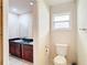 Bathroom with double vanity, toilet and shower at 23315 Charlston Pl, Land O Lakes, FL 34639