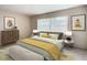 Spacious bedroom with large window and neutral color palette at 23315 Charlston Pl, Land O Lakes, FL 34639
