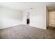 Simple bedroom with access to en-suite bathroom and hallway at 23315 Charlston Pl, Land O Lakes, FL 34639