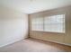 Bedroom with window, closet and carpet at 23315 Charlston Pl, Land O Lakes, FL 34639