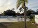 Refreshing community pool with lounge chairs and tables at 23315 Charlston Pl, Land O Lakes, FL 34639