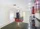 Modern kitchen with dark wood cabinets and granite countertops at 23315 Charlston Pl, Land O Lakes, FL 34639