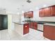 Modern kitchen with stainless steel appliances and an island at 23315 Charlston Pl, Land O Lakes, FL 34639