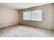 Bright and airy living room with neutral carpeting at 23315 Charlston Pl, Land O Lakes, FL 34639