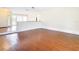 Living room with hardwood floors and a half wall at 23315 Charlston Pl, Land O Lakes, FL 34639