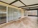 Screened patio with sliding glass doors at 23315 Charlston Pl, Land O Lakes, FL 34639