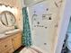 Updated bathroom with walk-in shower and tiled floors at 3409 Tarlton N St, St Petersburg, FL 33713
