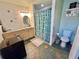 Clean bathroom with shower, toilet, and vanity at 3409 Tarlton N St, St Petersburg, FL 33713