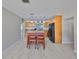 Bright kitchen with stainless steel appliances, light wood cabinets, and island with seating at 4116 Ohio Ave, Tampa, FL 33616
