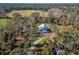 A lovely two story home surrounded by trees in a sprawling rural setting with pasture land at 4501 Keene Rd, Plant City, FL 33565