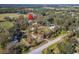 Aerial view of the property, highlighting its lush greenery and multiple buildings at 4501 Keene Rd, Plant City, FL 33565