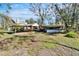 Beautiful backyard with outdoor pavilion structures, great for entertaining and relaxation at 4501 Keene Rd, Plant City, FL 33565