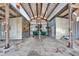 Inside the barn, there's a boat on a trailer, showcasing the spacious storage capacity at 4501 Keene Rd, Plant City, FL 33565