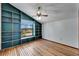 Bedroom with built-in shelves and wood floors at 4501 Keene Rd, Plant City, FL 33565