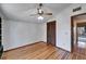 Bedroom with wood floors and ceiling fan at 4501 Keene Rd, Plant City, FL 33565
