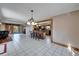 Open dining area with tile floor, bar seating, and natural wood trim at 4501 Keene Rd, Plant City, FL 33565