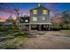 Charming two-story home showcasing its elevation, set against a beautiful twilight sky at 4501 Keene Rd, Plant City, FL 33565