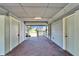 Outdoor patio with access to both the lawn and garage at 4501 Keene Rd, Plant City, FL 33565