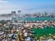 Aerial view of waterfront home with private pool and canal access at 529 80Th Ave, St Pete Beach, FL 33706