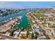 Bird's-eye view showcasing a house with a pool, near the waterway at 529 80Th Ave, St Pete Beach, FL 33706