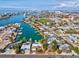 A waterfront home with a pool and lush landscaping at 529 80Th Ave, St Pete Beach, FL 33706