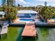 Bird's eye view of home, pool, and private dock on the water at 529 80Th Ave, St Pete Beach, FL 33706