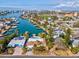 Waterfront home with pool and lush landscaping, solar panels at 529 80Th Ave, St Pete Beach, FL 33706