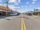 Street view of shops and restaurants with festive decorations at 529 80Th Ave, St Pete Beach, FL 33706