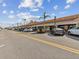 Shops and restaurants line a street with parked cars at 529 80Th Ave, St Pete Beach, FL 33706