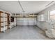 Large garage with workshop and storage shelving at 529 80Th Ave, St Pete Beach, FL 33706