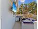 Stainless steel appliances and tile-accented outdoor kitchen at 529 80Th Ave, St Pete Beach, FL 33706