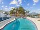Relaxing pool with spa and canal views; outdoor entertaining space at 529 80Th Ave, St Pete Beach, FL 33706