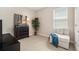 Cozy bedroom featuring a neutral color scheme, perfect for relaxation and privacy at 7122 Heron Walk Ln, Wesley Chapel, FL 33545