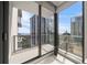 A cozy balcony space, enclosed in glass, offering city views and allowing for natural light at 100 1St N Ave # 1601, St Petersburg, FL 33701