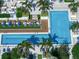 Stunning aerial view of the community pool area with tropical landscaping and ample seating at 100 1St N Ave # 1601, St Petersburg, FL 33701