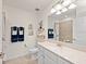 Clean bathroom with a large vanity and shower at 10043 Crooked Creek Dr # 101, Venice, FL 34293