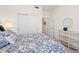 Spacious bedroom with a queen-size bed and plenty of closet space at 10043 Crooked Creek Dr # 101, Venice, FL 34293