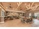 Community coffee bar with comfortable seating and large artwork at 10043 Crooked Creek Dr # 101, Venice, FL 34293
