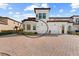 Two-story townhome with two-car garage and attractive landscaping at 10043 Crooked Creek Dr # 101, Venice, FL 34293