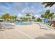 Relax by the resort-style pool with plenty of lounge chairs at 10043 Crooked Creek Dr # 101, Venice, FL 34293