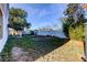 Large backyard with grassy area and privacy fence at 11309 Outrigger Ave, Spring Hill, FL 34608
