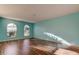 Bright bedroom with light walls and wood flooring at 11309 Outrigger Ave, Spring Hill, FL 34608